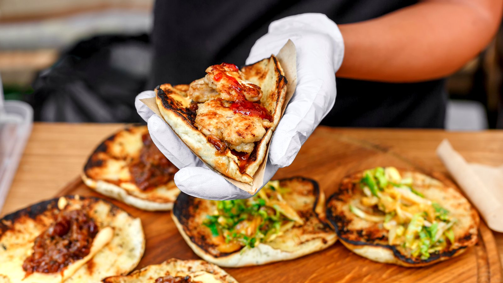 Street vendor making tacos