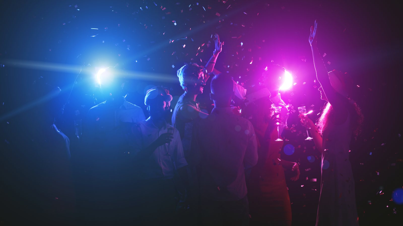 Young friends dancing at a club celebration