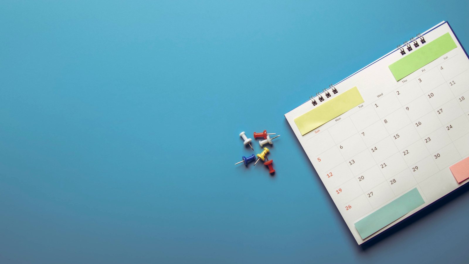 Calendar page with pins — planning the trip